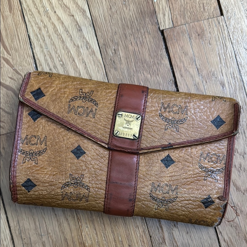 MCM Brown Leather Wallet with Logo Pattern